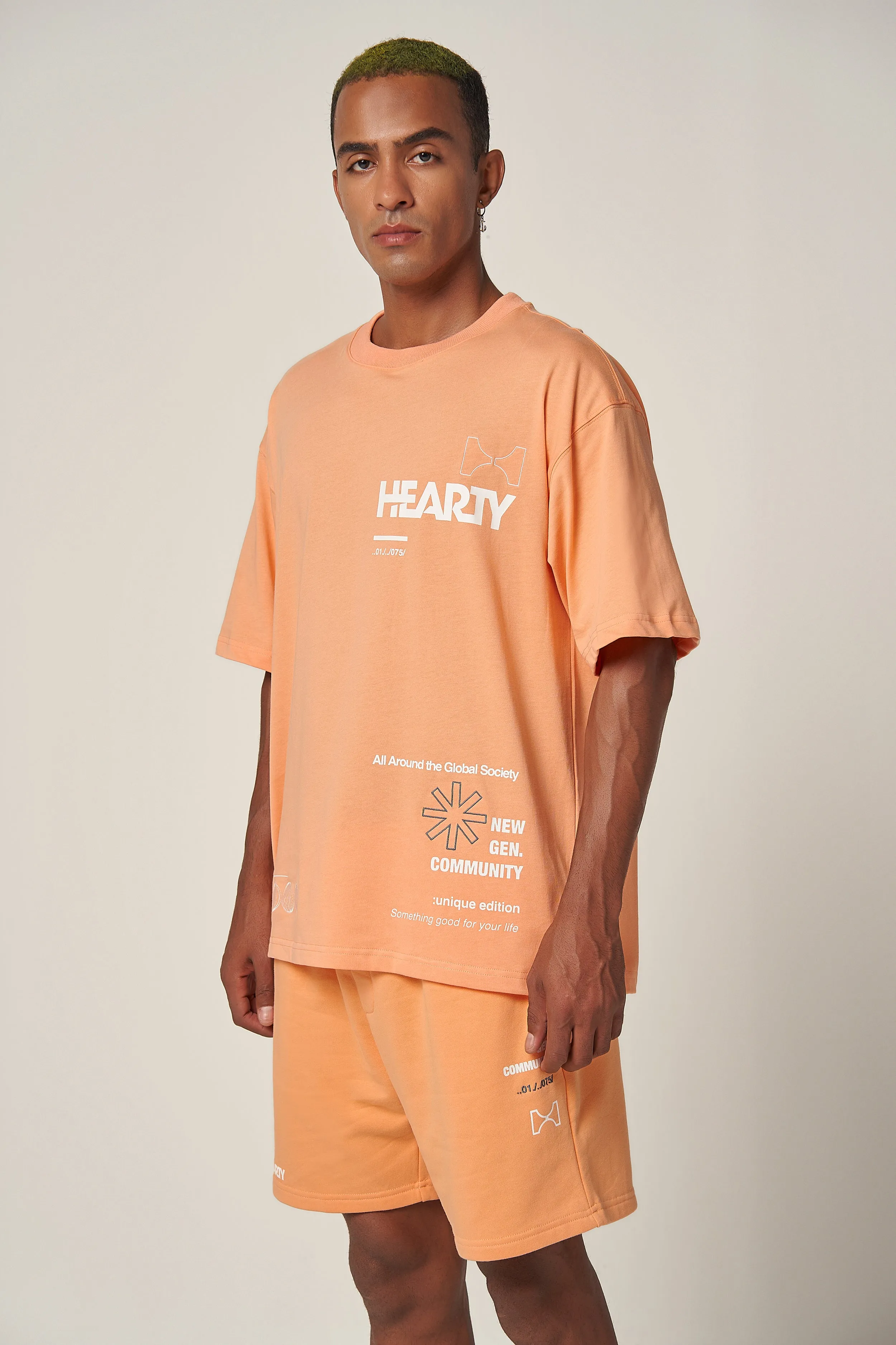 HEARTY GLOBAL COMMUNITY T-SHIRT - SOFT ORANGE (UNISEX)